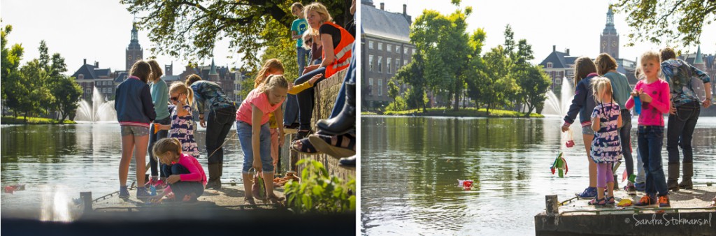 Kinderen laten hun gevouwen bootjes te water tijdens het initiatief van Liesje Doet, evenement fotografie Sandra Stokmans