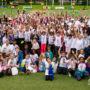 Groepsfoto uit de foto reportage van Unit4 Cares Kids Sports Day in Rotterdam, foto door Sandra Stokmans Fotografie